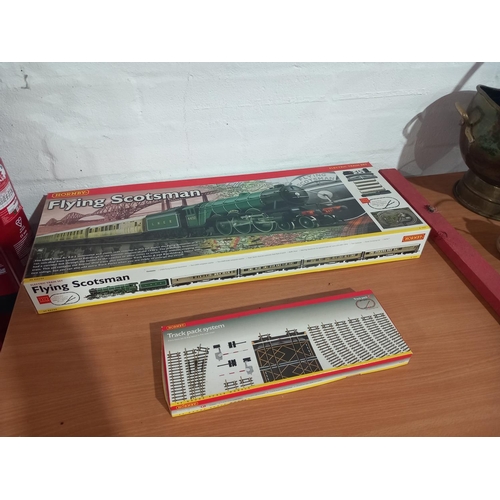 500 - A boxed Hornby flying Scotsman train set and a box hornby pack system