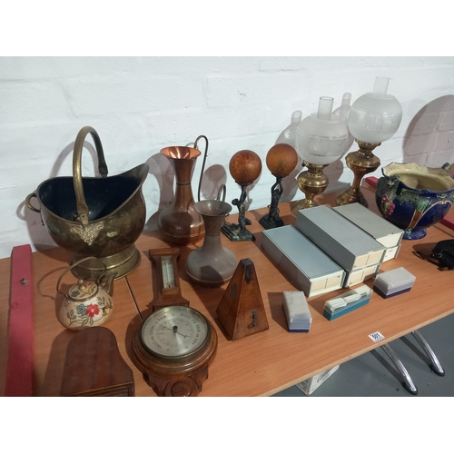 501 - A pair of art deco style lamps, oil lamps, glass coal scuttle, jardiniere and other decorative items