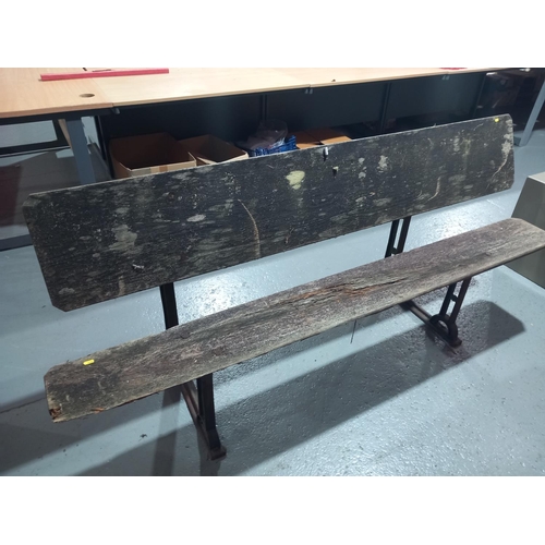 551 - A cast iron based metamorphic garden bench/table