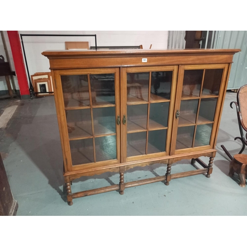 565 - A mahogany glass fronted display cabinet