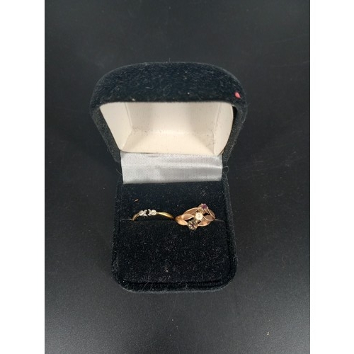 107 - Two 18k gold rings (one being scrap) weight including stones 2.7g