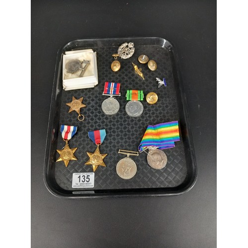 135 - A collection of British medals and badges - a WW1 war medal awarded to PTE V Sales - Duke of Welling... 