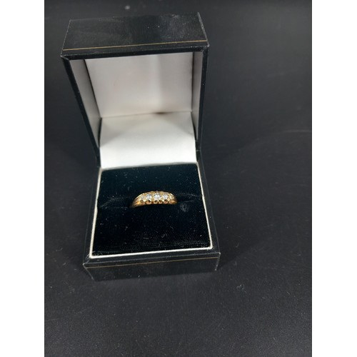 210 - An 18k gold and diamond engagement ring (XRF tested)