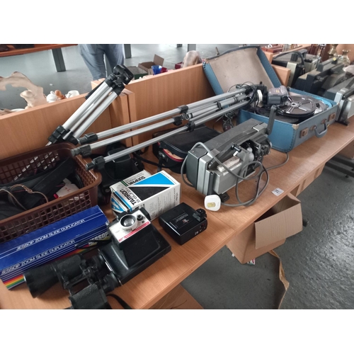 28 - Polaroid cameras, boxed Tamron lenses, reel to reels and other vintage items