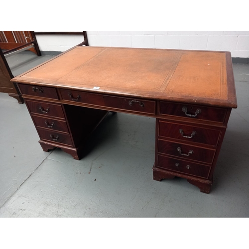 99 - A mahogany twin pedestal desk with leatherette insert

Measurements: 59.5 inches Length
36 inches wi... 