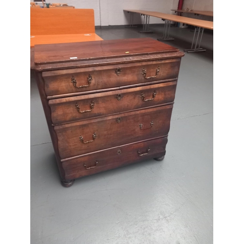 115 - A mahogany serpentine front chest of drawers