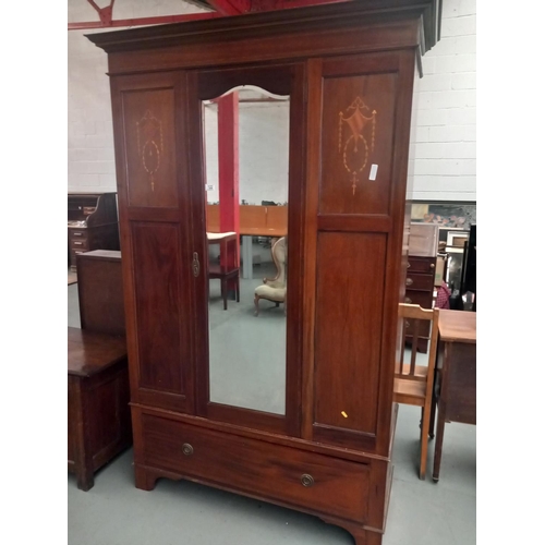 122 - A mahogany inlaid mirrored door wardrobe