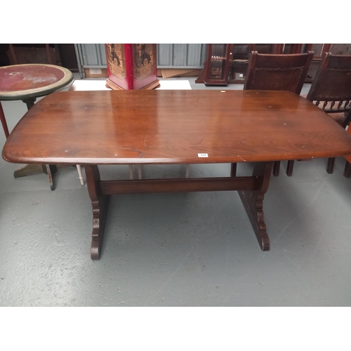 124 - An Ercol dining table