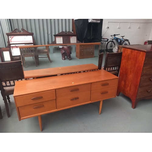 125 - A teak dressing table