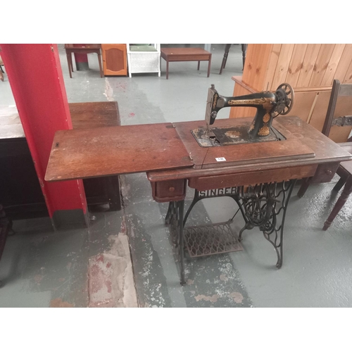 136 - A singer sewing machine and treadle