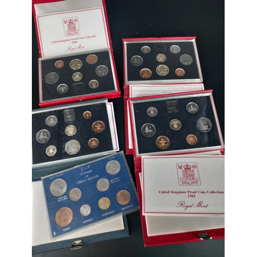 217 - Four Royal Mint coin sets - 1986,1985,1986, 1984 and coinage of Great Britain