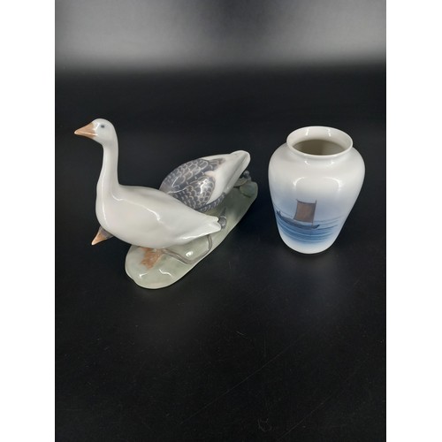 204 - A Royal Copenhagen figure No 609 (7 inches long) two geese together with a small Royal Copenhagen va... 