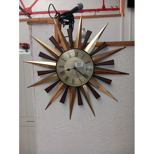 236 - A mid century metamec starburst wall clock