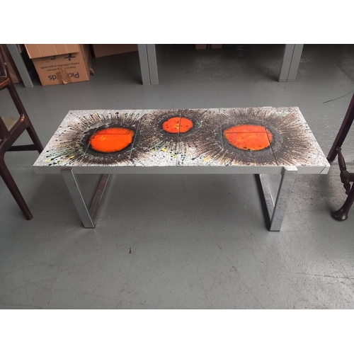 103 - A vintage tiled top coffee table and chrome metal base