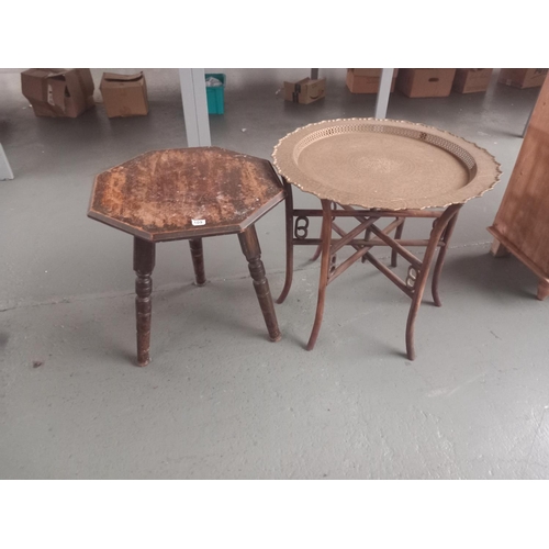 109 - A brass topped folding table together with an oak table (possibly cricket table)