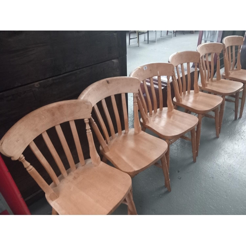 126 - Six pine dining chairs