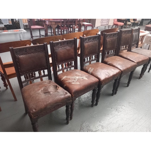 128 - Six oak framed leatherette upholstered dining chairs