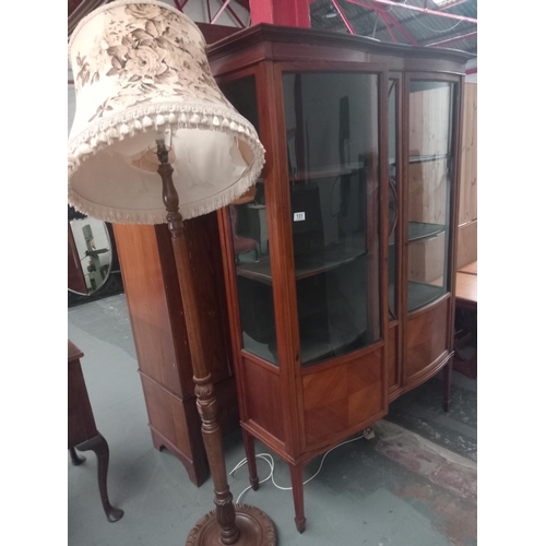 131 - An edwardian display/china cabinet together with a standard lamp