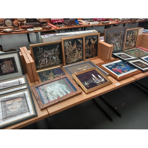 25 - A selection of framed silk artwork
