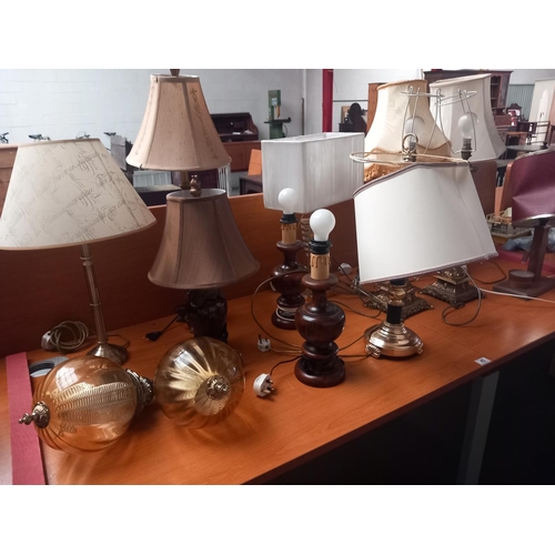 45 - A selection of metalware and wooden table lamps, pendants etc