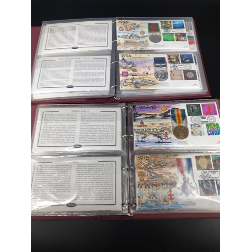 216 - Two Benham albums containing 40 medalic Benham First Day covers commemorating famous battles and med... 