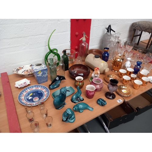 20 - Decorative china and glassware to include poole ornaments, decanters, part tea service etc