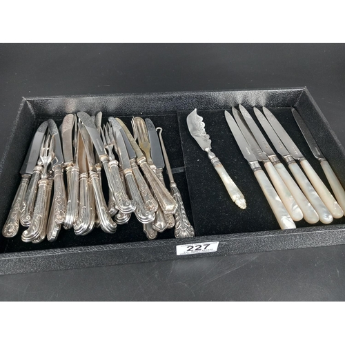 227 - Silver handled cutlery and silver fruit knives with mother of pearl handles