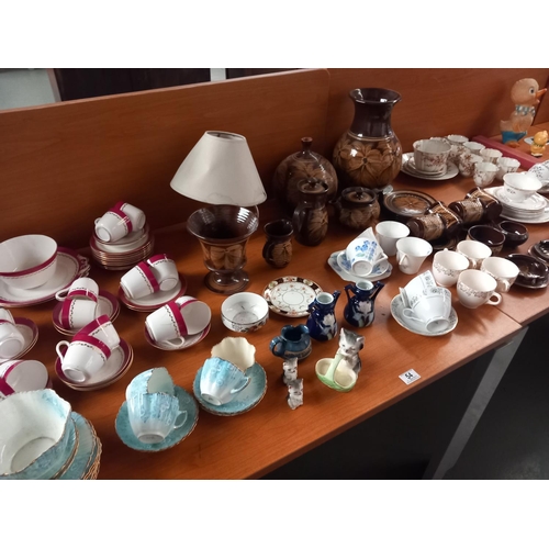 54 - Various part tea services together with decorative pottery