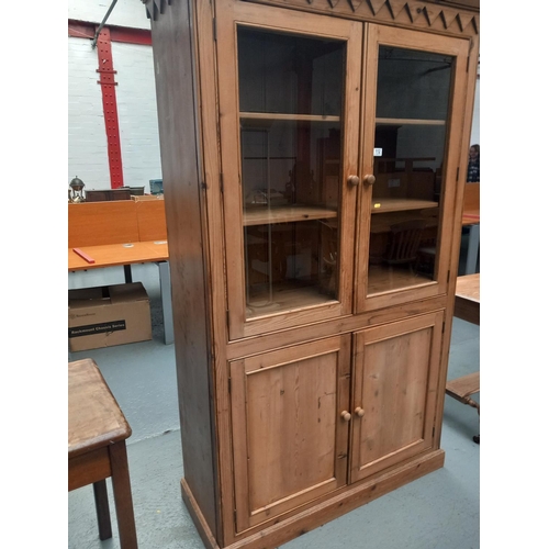 112 - A pine display cabinet