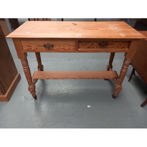 113 - A pine two drawer desk