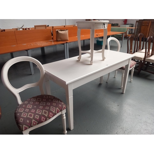 118 - A painted white dining table with two chairs anda  circular coffee table