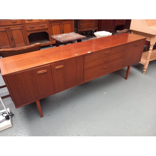 129 - An Avalon teak sideboard