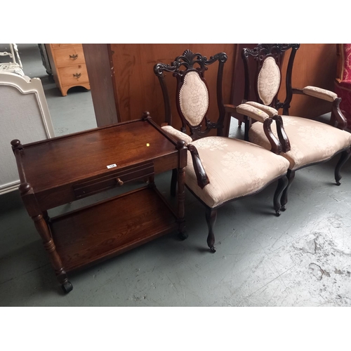 138 - Two upholstered armchairs and an oak single drawer table