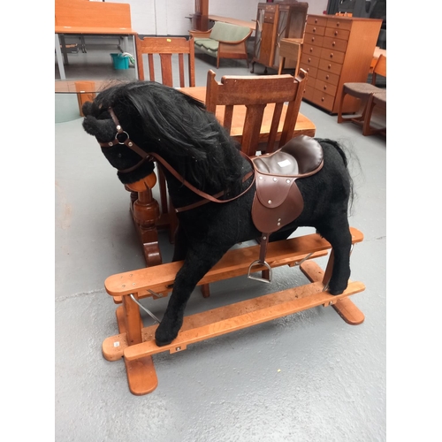 150 - A vintage rocking horse