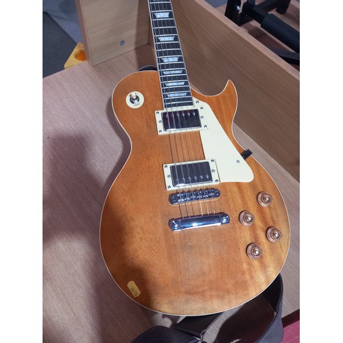 32 - An electric gibson les paul custom guitar -believed to be a copy