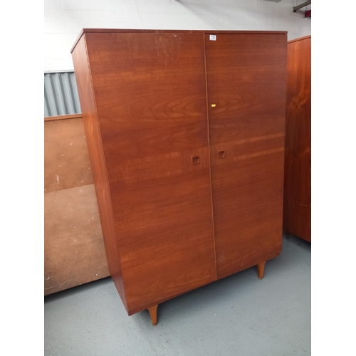 119 - A teak stonehill double wardrobe