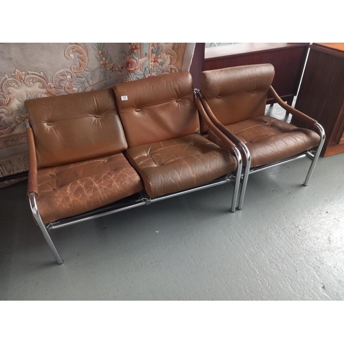 125 - A Pieff chrome frame two seater sofa and armchair