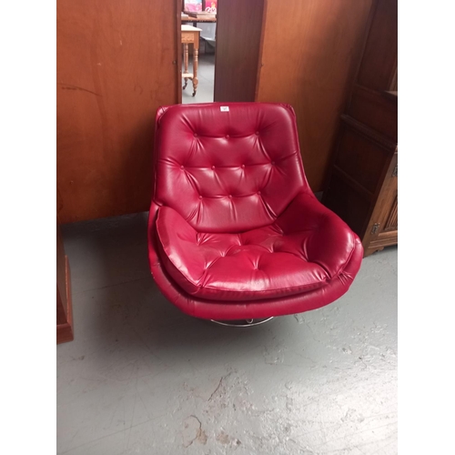 127 - A mid century leatherette swivel chair