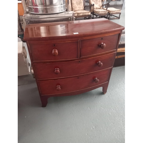 133 - A mahogany bow fronted two over two chest of drawers