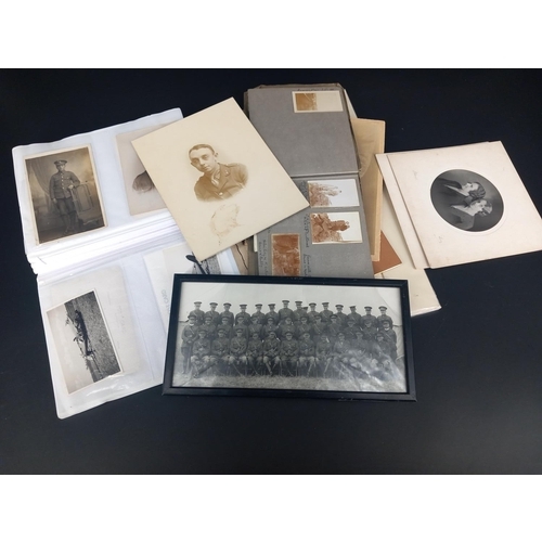 220 - A collection of early photographs to include military along with postcards