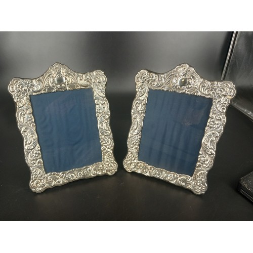 205 - A pair of large hallmarked silver picture frames glass size 18x14cm