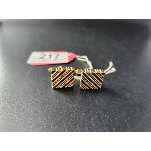 217 - A pair of heavy 9k gold cufflinks - weight 21.5 grams