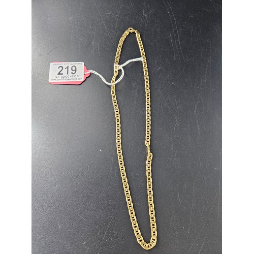 219 - An 18k gold heavy link chain, length 20 inches - weight 13.4 grams