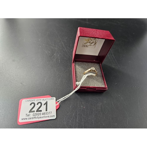 221 - A 9k gold and solitaire diamond ring - weight 2.4 grams