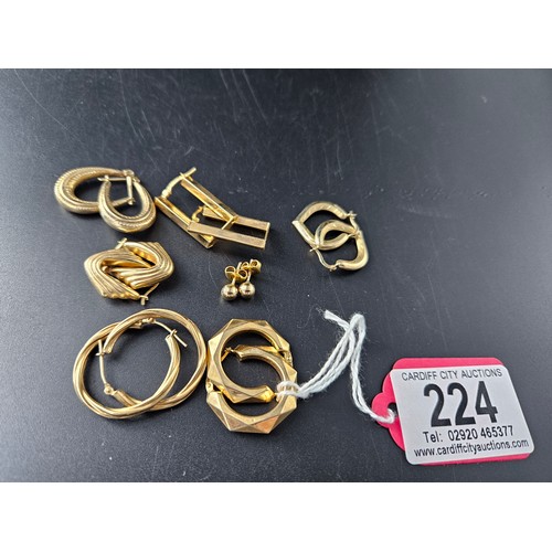 224 - Seven pairs of various design 9k gold earrings (pierced ears) - combined weight is 12.5 grams