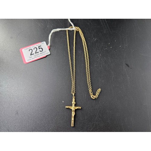 225 - A 9k gold crucifix on a 9k gold chain - combined weight 7.2 grams