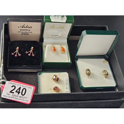 240 - Four pairs of 9k gold earrings (pierced ears)