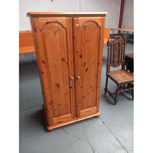 113 - A small pine wardrobe

Height 142cm
Width 81cm
Depth 56cm