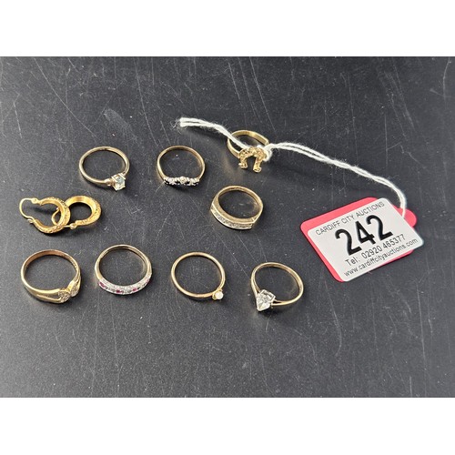 Eight 9k gold rings and a pair of 9k gold earrings weight including ...