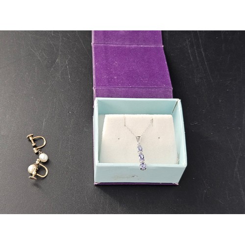 245 - A pair of 9k gold and pearl earings (screw fastenings) and a 9ct white gold lavender blue tanzamite ... 